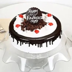 fathers black forest celebration cake with chocolate layers whipped cream and cherries