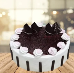 fresh berry indulgence cake with blueberry cream layers and fresh topping