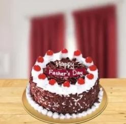 super dad black forest cake with chocolate layers whipped cream and cherries