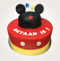 toon mouse celebration cake with colorful cartoon theme design
