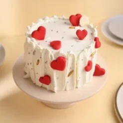 velvet love sweetheart cake with soft cream layers and heart shape design