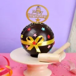 choco fury explosion cake with chocolate shell and hidden surprise inside