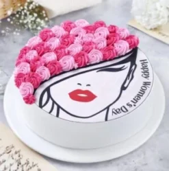 empower her celebration cake with elegant design and soft cream layers