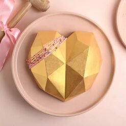golden love smash pinata cake with elegant design and hidden surprise inside