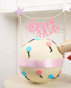 golden pineapple pinata blast cake with surprise filling inside and dome shape