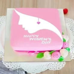 her happy celebration cake with soft cream layers and elegant design