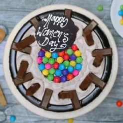 lady kitkat indulgence cake with chocolate bars and creamy layers