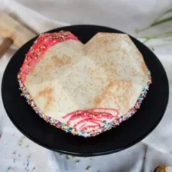 love burst pinata surprise cake with heart shape and hidden chocolates inside