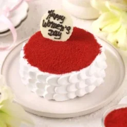 scarlet bloom celebration cake with red velvet layers and elegant floral design