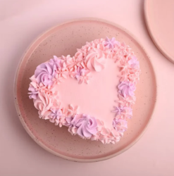 blush floral heart cake with romantic design for valentine celebration