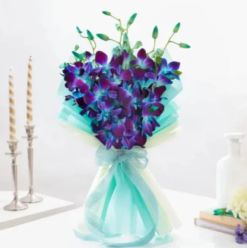 Elegant bouquet of fresh blue orchids beautifully arranged for gifting