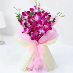 Beautiful bouquet of fresh purple orchids arranged for elegant gifting