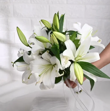 Snowy White Bloom Bouquet Snowy white flower bouquet for elegant gifting and celebration