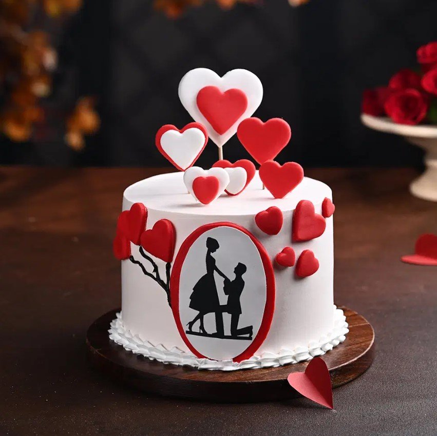 True Love Heart Cake True Love Heart Cake in the shape of a heart, decorated with elegant designs to celebrate love.