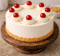 cherry velvet vanilla crown cake with soft cream layers and cherry topping