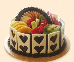choco fruit royale cake with chocolate layers and fresh fruits topping