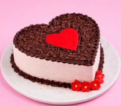 heartfelt cherry forest cake in heart shape with chocolate layers and cherry topping