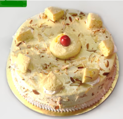 rasmalai royale fusion cake with creamy layers and indian sweet topping