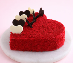 scarlet love essence cake with red velvet layers and heart shape design