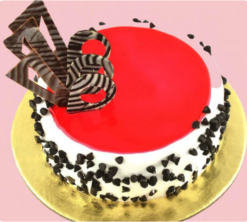 strawberry luxe spotlight cake with creamy layers and strawberry topping