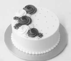 vanilla aura elegance cake with soft cream layers and smooth finish